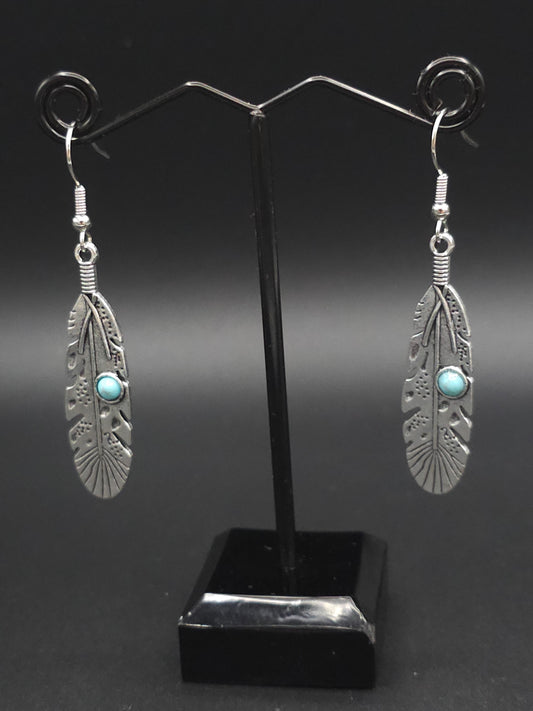 Stunning Silver Feather Earrings With a Turquoise Accent