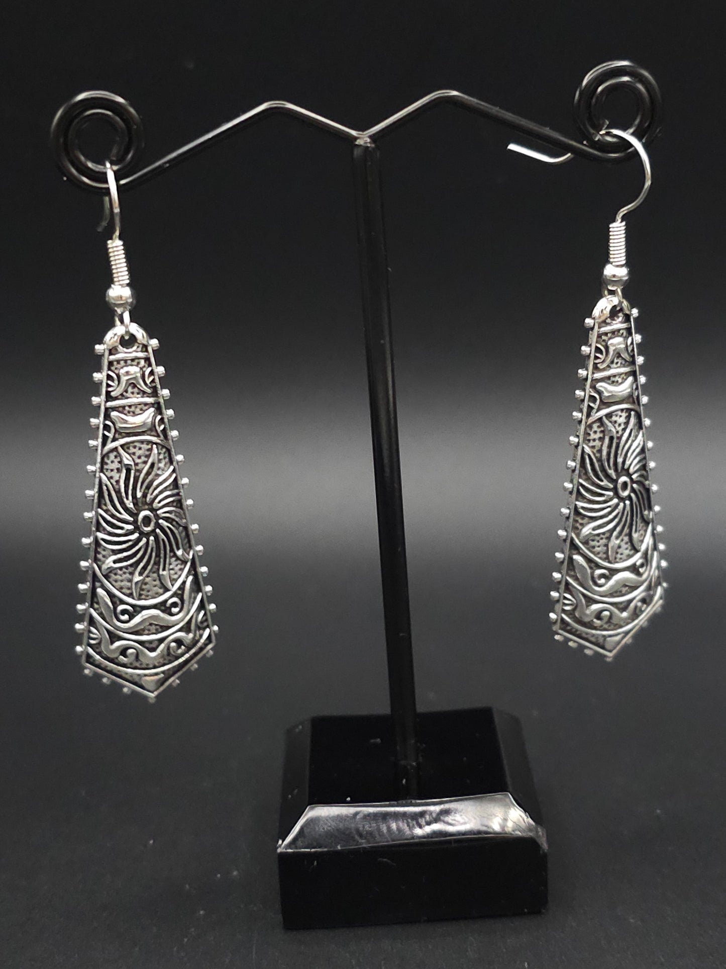 Beautifully Carved Earrings with a Unique Drop Shape